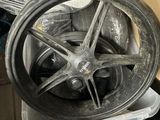 a wheel that is sitting on top of a box