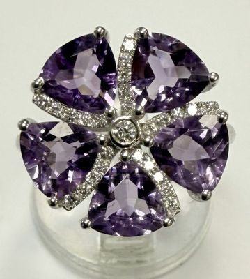 purple amethorate and diamond flower ring on clear base
