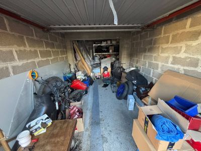 a room with a lot of boxes and other things in it