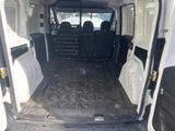a white van with the doors open and the back seats down