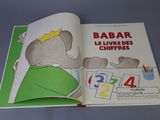 a picture of a book with a picture of a baby elephant