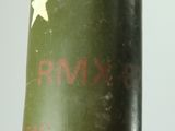 a close up view of a green military bomb