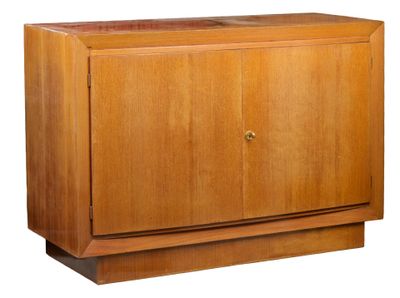 a wooden cabinet with a door and a drawer
