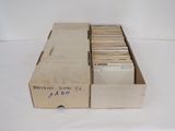 a box of old records sitting on a table