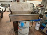 an image of a kitchen sink in a garage