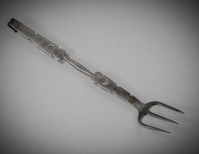 a fork that is sitting on top of a table