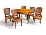 six chairs and a table with a wooden table top