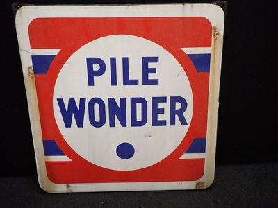 une pancarte sur laquelle est écrit « Pile Wonder »
