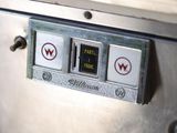 a close up of a metal box with buttons on it