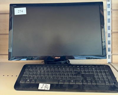 an image of a computer monitor and keyboard on a desk