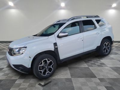 a white suv parked in a room with a checkered floor