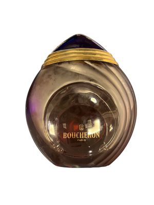 an image of a bottle of perfume on a white background