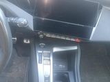 a picture of a car dashboard with a car radio in it