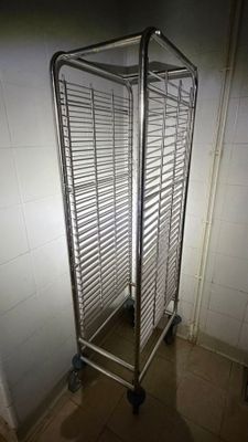an image of a metal pan rack in a bathroom
