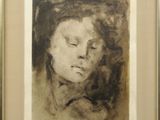 painting of a woman ' s face in a black and white frame