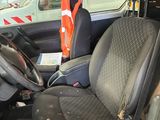 an image of a van with a seat and steering wheel