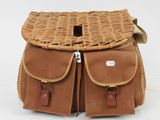 an image of a brown wicker bag with two brown handles