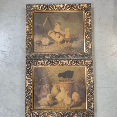 two paintings of cats and kittens are hanging on a wall