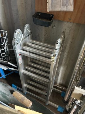 a metal rack that has a bunch of items in it
