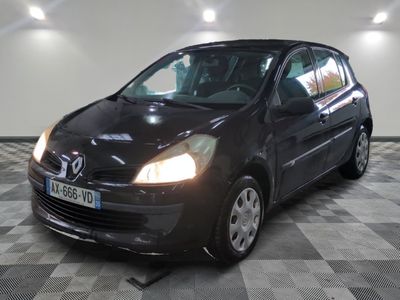 a picture of a black car parked in a garage