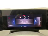 the dashboard of a car with a digital display on it