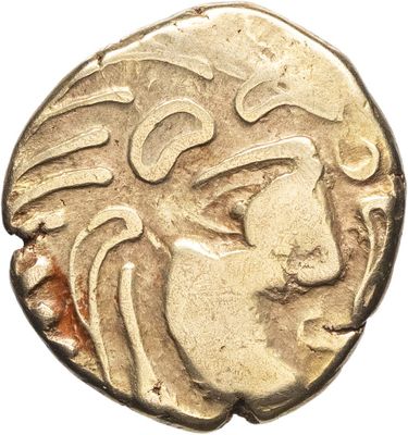 un gros plan d'une pièce de monnaie avec un visage dessus
