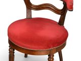 an old chair with red upholstered upholstered upholstered upholstered upholstered upholstered upholstered upholstered upholstered
