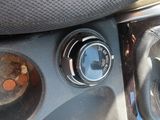 a close up of a car ' s dashboard with buttons