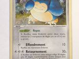 an image of a pokemon card with a picture of a blue bird on it