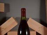 a bottle of wine that is sitting on a table