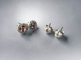 a pair of pink and white diamond stud earrings