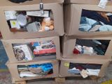 several cardboard boxes stacked on top of each other in a room
