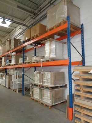 many shelves with boxes and boxes on them in a warehouse