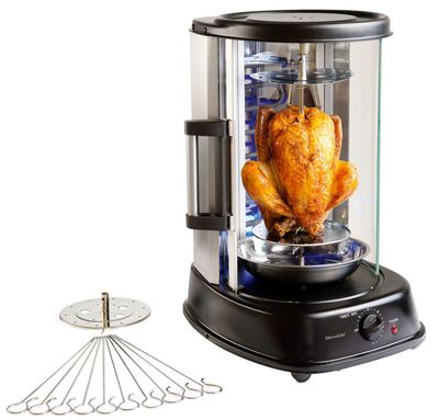 une image représentant un rôtissoire contenant un poulet