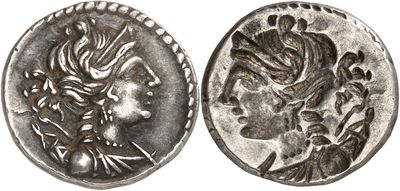 a silver coin with an image of a woman on it