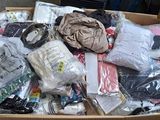 a box full of clothes and other items in it
