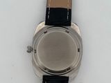 a watch that is sitting on top of a white table