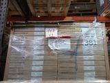 a stack of boxes that are on a pallet in a warehouse