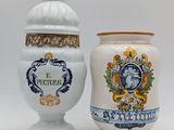 two vases sitting next to each other on a table