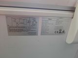a close up of a label on a white refrigerator