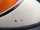 an image of a close up of a light on a car ' s dashboard