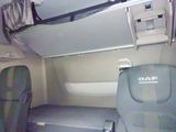 a picture of the inside of an airplane with the seats down