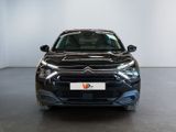 the front of a black citrole parked in a garage