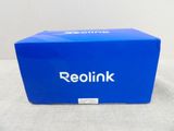 un gros plan d'une boîte bleue sur laquelle figure le logo Redlink