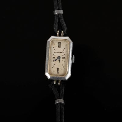 LONGINES. Bracelet-montre de dame en platine, cadran rectang… - Photo 1