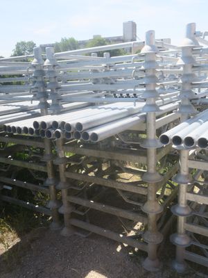 a lot of pipes that are stacked on top of each other