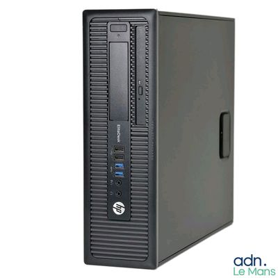 a black desktop computer sitting on top of a white surface