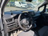 a car dashboard with a steering wheel and a dash board