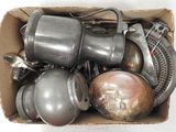 many pots and pans in a box on the table