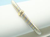 a pen sitting on top of a napkin on top of a table